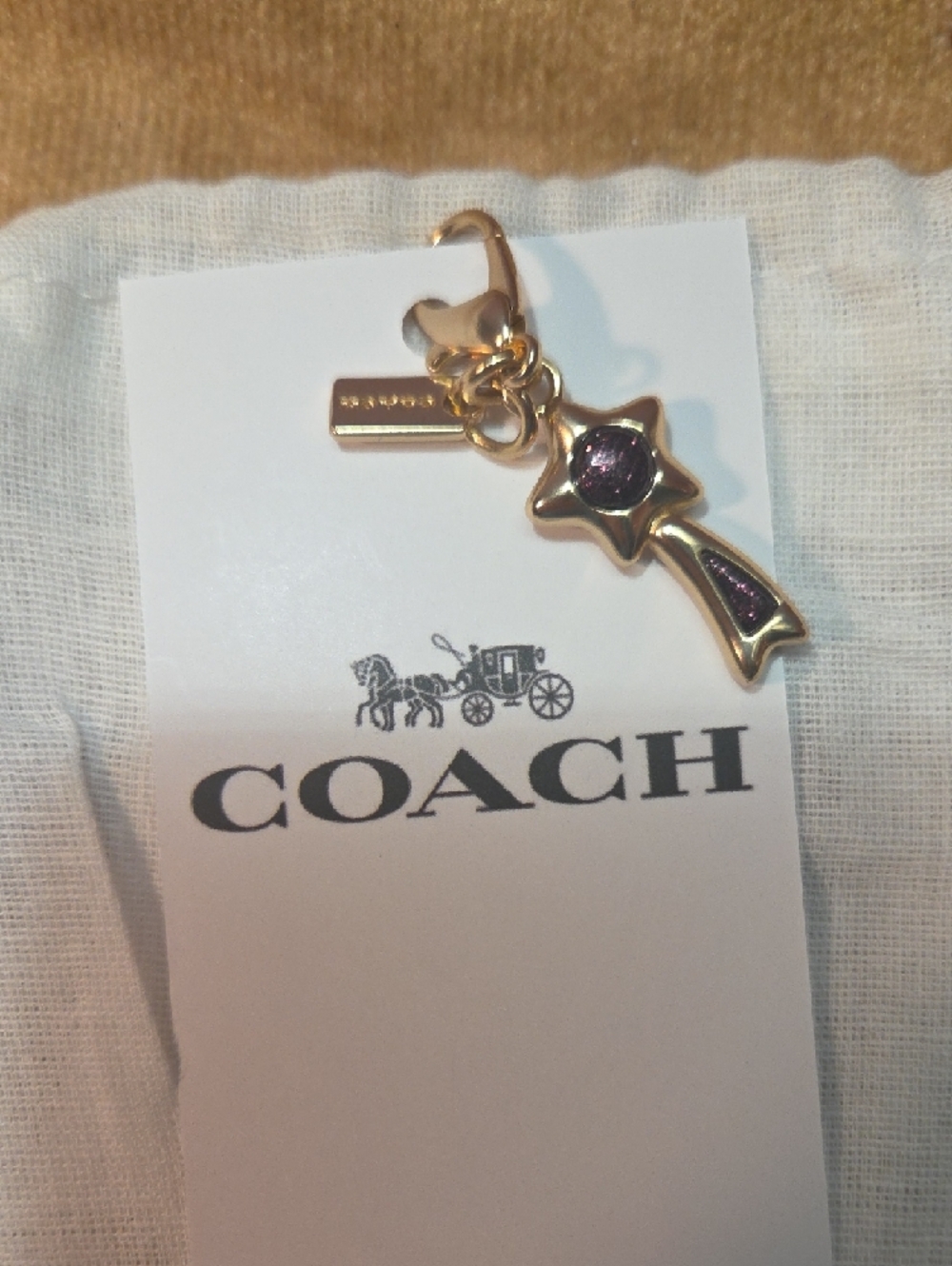 Coach Gold-Tone Star Charm Keychain with Purple Accent - Picture 2 of 2